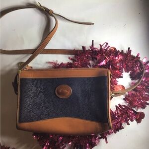 Dooney & Bourke Tan and Black Crossbody Bag with Timeless Design